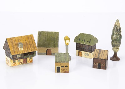 Lot 458 - A continental painted solid wood village