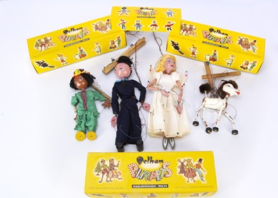 Lot 556 - Four yellow boxed Pelham Puppets