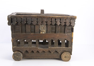 Lot 603 - A Nuristan (Afghanistan) wooden toy cart