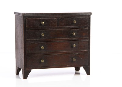 Lot 659 - An early 19th century apprentice oak chest of drawers