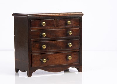 Lot 660 - An early 19th century mahogany chest of drawers