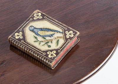Lot 663 - A 19th century tooled leather and embroidered pin-cushion book