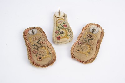 Lot 664 - Three embroidered wall hanging pocket watch holders