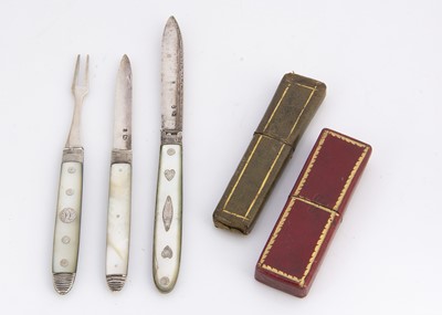 Lot 698 - An early 19th century mother of pearl and silver folding fruit knife and fork in leather case