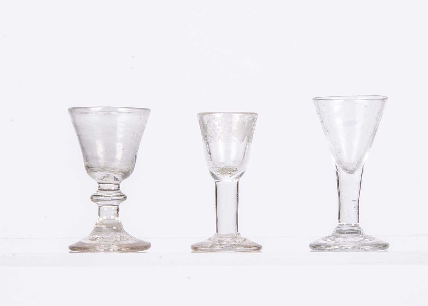 Lot 724 - Three dolls’ or miniature drinking glass