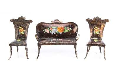 Lot 749 - A German 19th century painted tinplate dolls’ house sofa and two chairs