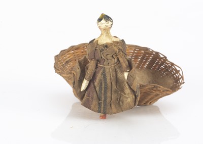 Lot 757 - A tiny mid 19th century dolls’ house Grodnerthal wooden doll