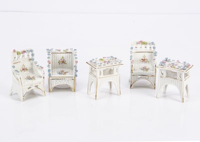 Lot 781 - German porcelain dolls’ house garden furniture