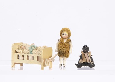 Lot 811 - An all-bisque dolls’ house doll