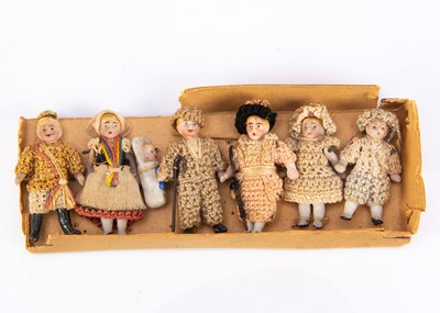 Lot 812 - A Horn all-bisque dolls’ house family in original box base