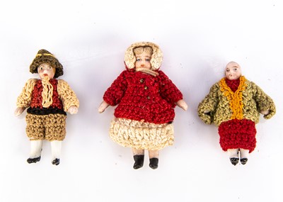 Lot 813 - Four Horn all-bisque dolls’ house dolls