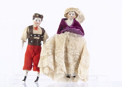 Lot 820 - Two 19th century bisque shoulder-head dolls’ house dolls