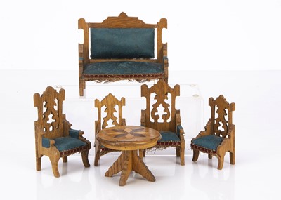 Lot 828 - An early 20th century oak dolls’ house sitting room set