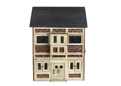 Lot 852 - A painted wooden dolls’ house circa 1900