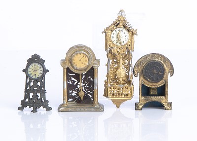 Lot 859 - German metal dolls’ house clocks