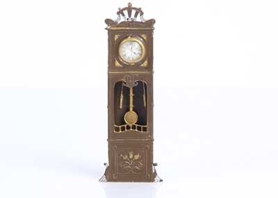 Lot 860 - A German soft metal and tinplate dolls’ house Art Nouveau long case clock