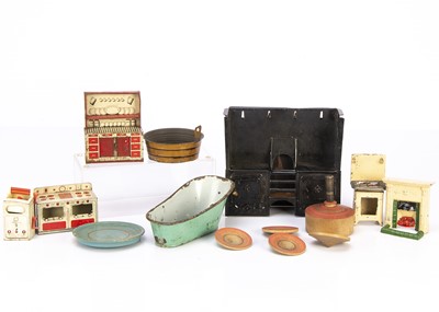 Lot 895 - A large tinplate dolls’ house cooking range