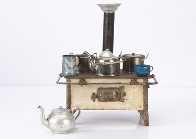 Lot 960 - A German tinplate toy stove