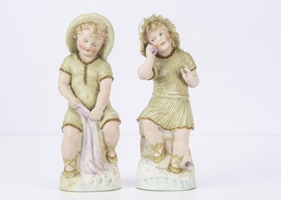 Lot 974 - A small pair of Gebruder Heubach children by the seaside