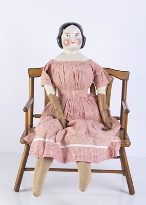 Lot 988 - A 19th century German pink tinted shoulder head doll possibly by Kestner