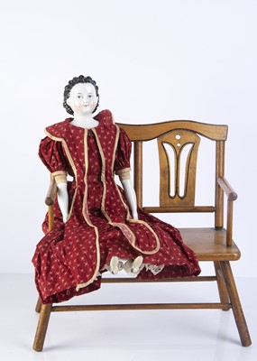 Lot 989 - An unusual 19th century German china shoulder head doll