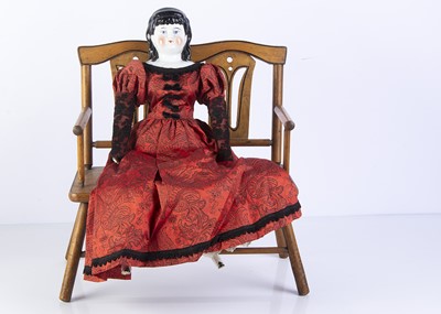 Lot 992 - A 19th century German china shoulder-head doll