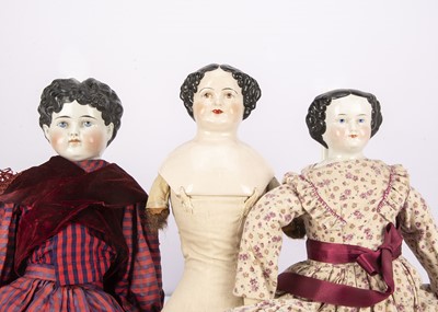 Lot 994 - Three china shoulder-head dolls