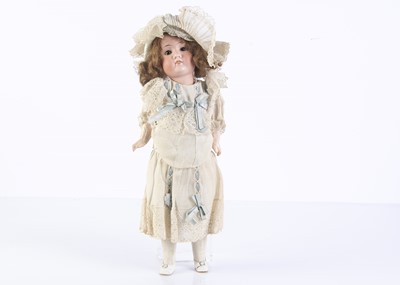 Lot 1000 - A Schoeanau & Hoffmeister 1906 child doll in factory clothes