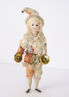 Lot 1011 - A German bisque headed clown cymbalists toy