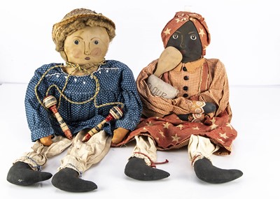 Lot 1036 - A pair of American vintage primitive cloth dolls