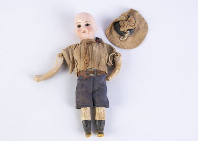 Lot 1062 - A small Armand Marseille 390 Boy Scout doll