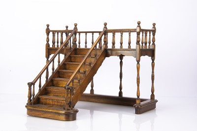 Lot 1084 - A recent well made wooden staircase display stand