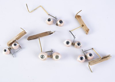 Lot 1100 - Five pairs of bisque and glass Steiner eyes