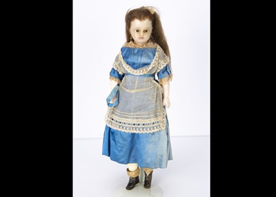 Lot 1106 - A German mid 19th century wax over composition shoulder head child doll