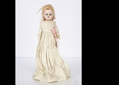 Lot 1110 - A late 19th century wax over composition shoulder head doll