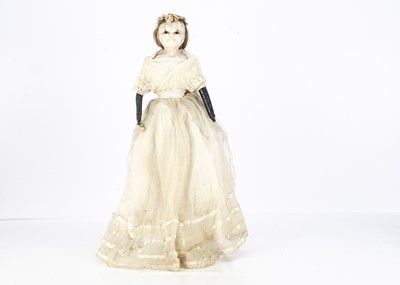 Lot 1112 - An early 19th century English wax over papier-mache child doll