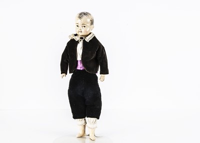 Lot 1113 - A mid 19th century German composition shoulder-head boy doll