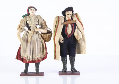 Lot 1120 - A 19th century composition couple probably in Polish National Dress