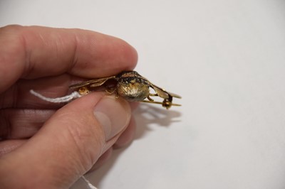 Lot 9 - A modern silver gilt and enamelled honey bee brooch by AIO