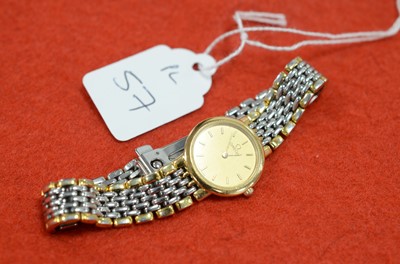 Lot 57 - An Omega De Ville quartz stainless steel and gilt lady's wristwatch