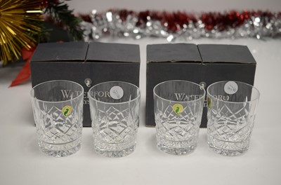 Lot 81 - A set of four modern Waterford Lead Crystal Lismore pattern Whisky tumblers