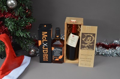 Lot 153 - A boxed bottle of Jack Daniels McLaren Whiskey and a cased Millenium Ale limited edition from King & Barnes