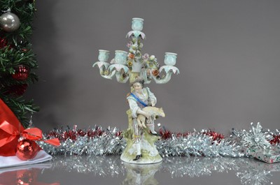 Lot 185 - An early 20th century German porcelain figural candlestick