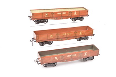 Lot 61 - Three Bassett-Lowke 0 Gauge unboxed NE orange/tan bogie Brick wagons (3)