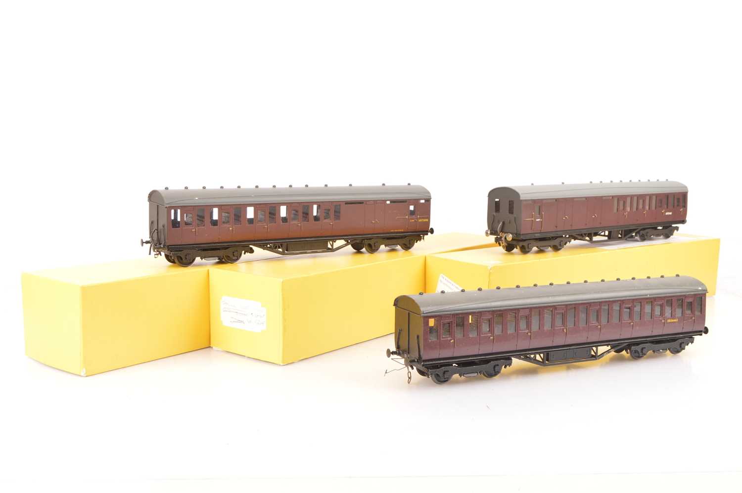 Lot 225 - The Wagon &  Carriage Works 0 Gauge maroon Thompson Suburban Coaches (3)