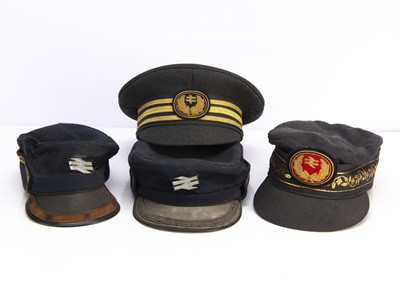 Lot 547 - Four BR Peaked Caps