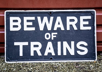 Lot 585 - Cast Iron Beware of Trains Notice