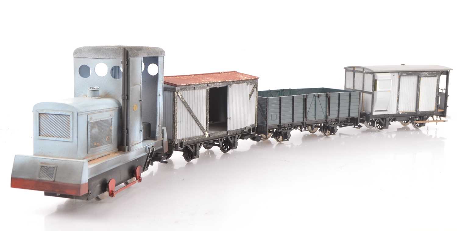 Lot 723 - A Scratch-built Gauge 1 battery-powered narrow-gauge 0-4-0 Diesel Locomotive and three modified LGB wagons (4)