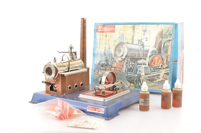 Lot 808 - Wilesco D12  Live Steam and Power plant with single cylinder and Flywheel on blue base