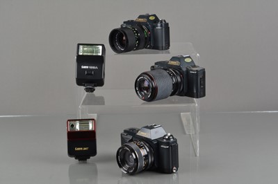 Lot 40 - Three Canon T SLR Cameras
